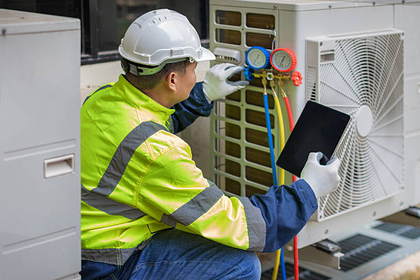 Professional Hvac technician working in Groveland, IL